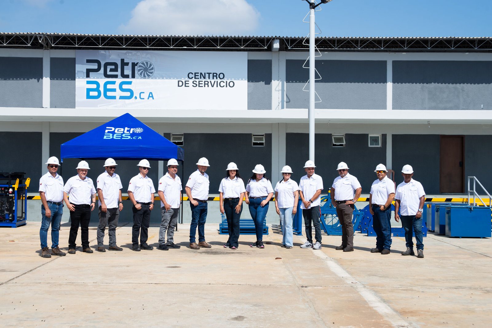 PetroBES team wearing personal protective equipment in front of the Service Center
